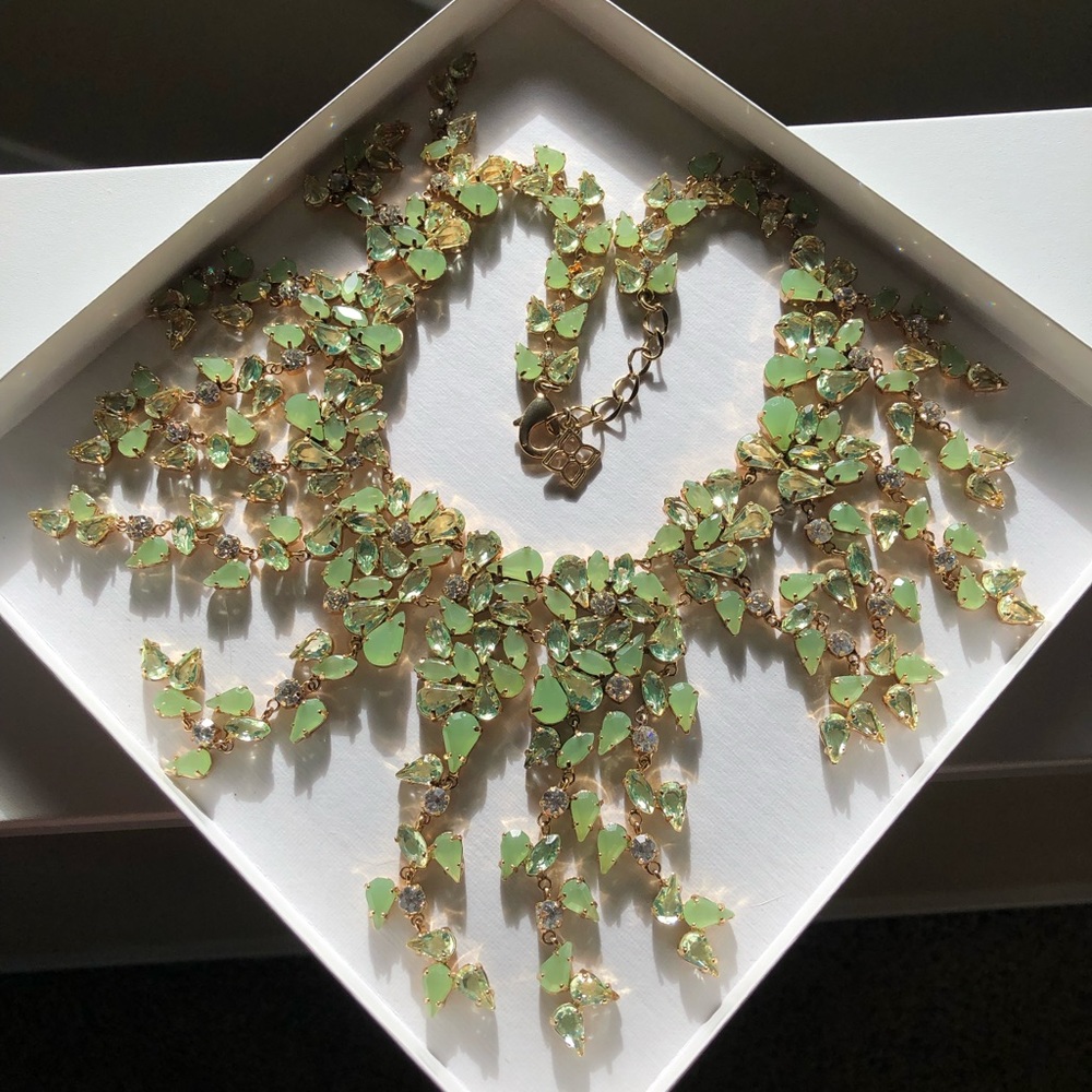 BCBGMaxAzria Gold and Green drop leaf necklace.